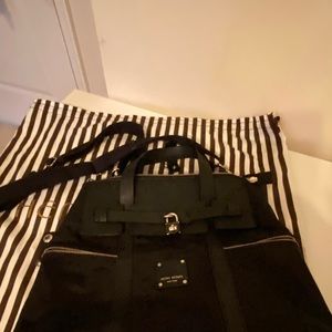 Iconic Henri Bendel jet setter bag